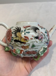 A Chinese famille rose 'rooster' teapot with applied floral design, two cups and a saucer, Yongzheng/Qianlong
