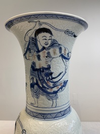 A Chinese blue, white and copper-red 'Liuhai' 'yenyen' vase, Kangxi
