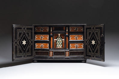 A fine ebony-veneered bone-inlaid cabinet, probably Italy, 19th C.