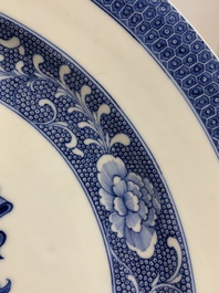 A Chinese blue and white armorial 'Marchant and Gallart accoll&eacute;' dish for the Dutch market, Qianlong
