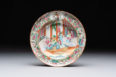 A pair of Chinese Canton famille rose armorial plates, 19th C.