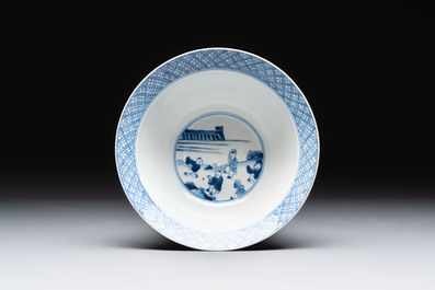 A Chinese blue and white 'klapmuts' bowl with narrative design, Kangxi mark and of the period
