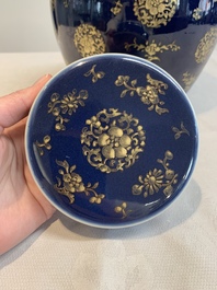 A Chinese gilt-decorated blue-ground jar and cover with floral design, Qianlong
