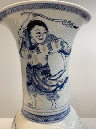 A Chinese blue, white and copper-red 'Liuhai' 'yenyen' vase, Kangxi