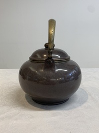 Three Chinese Thai market polished Yixing stoneware teapots with brass mounts, 19th C.