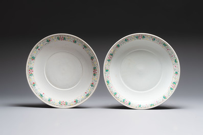 A pair of large Chinese famille rose 'dragon and phoenix' jardini&egrave;res and stands, 20th C.