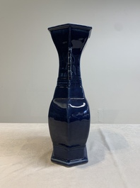 A pair of Chinese blue-glazed vases with handles, Qianlong