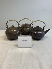 Three Chinese Thai market polished Yixing stoneware teapots with brass mounts, 19th C.