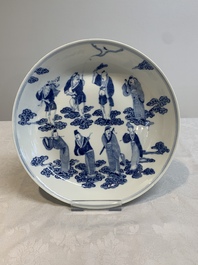 A pair of Chinese blue and white 'Eight Immortals' plates, Kangxi mark, 19th C.
