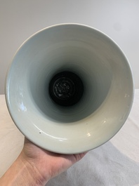 A Chinese blue, white and copper-red 'Liuhai' 'yenyen' vase, Kangxi