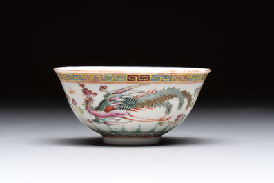 Four Chinese famille rose bowls and a blue and white bowl, Guangxu mark, 19/20th C.