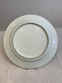 A Chinese blue and white armorial 'Marchant and Gallart accoll&eacute;' dish for the Dutch market, Qianlong