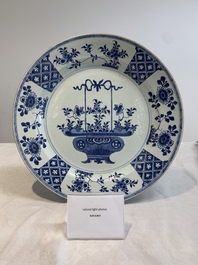 A pair of Chinese blue and white 'flower basket' dishes, Yongzheng