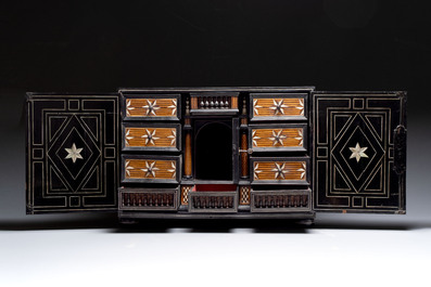 A fine ebony-veneered bone-inlaid cabinet, probably Italy, 19th C.
