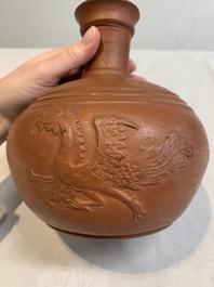 A pair of Yixing-style 'phoenix' bottle vases and covers, possibly England, 18th C.