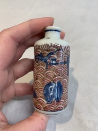 A pair of Chinese blue, white and copper-red 'mythical beasts' and a famille rose 'grasshopper' snuff bottle, Yongzheng and Daoguang mark, 19th C.