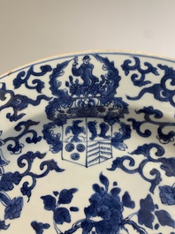 A Chinese blue and white armorial dish with the arms of Pelgrom for the Dutch market, Kangxi