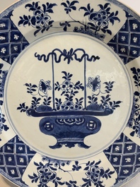 A pair of Chinese blue and white 'flower basket' dishes, Yongzheng