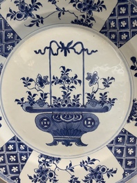 A pair of Chinese blue and white 'flower basket' dishes, Yongzheng