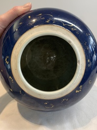 A Chinese gilt-decorated blue-ground jar and cover with floral design, Qianlong