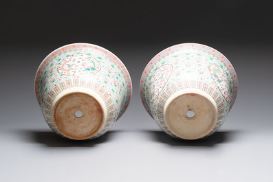 A pair of large Chinese famille rose 'dragon and phoenix' jardini&egrave;res and stands, 20th C.