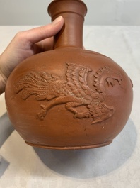 A pair of Yixing-style 'phoenix' bottle vases and covers, possibly England, 18th C.