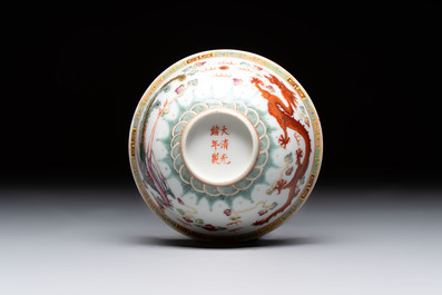 Four Chinese famille rose bowls and a blue and white bowl, Guangxu mark, 19/20th C.