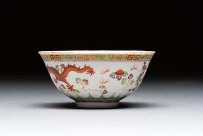 Four Chinese famille rose bowls and a blue and white bowl, Guangxu mark, 19/20th C.
