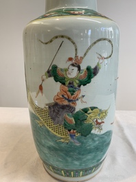 A Chinese famille verte rouleau vase with immortals, 19th C.