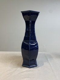 A pair of Chinese blue-glazed vases with handles, Qianlong