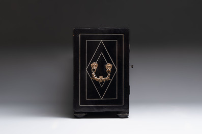 A fine ebony-veneered bone-inlaid cabinet, probably Italy, 19th C.