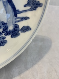 A pair of Chinese blue and white 'Eight Immortals' plates, Kangxi mark, 19th C.