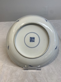 A pair of Chinese blue and white 'Eight Immortals' plates, Kangxi mark, 19th C.