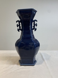 A pair of Chinese blue-glazed vases with handles, Qianlong