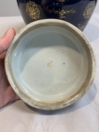A Chinese gilt-decorated blue-ground jar and cover with floral design, Qianlong