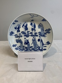 A pair of Chinese blue and white 'Eight Immortals' plates, Kangxi mark, 19th C.