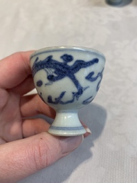 Six Chinese blue and white 'Hatcher cargo' stem cups with dragons, Transitional period