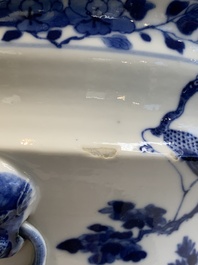 A pair of Chinese blue and white 'birds among flowering branches' jardini&egrave;res, 19th C.
