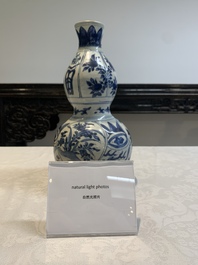 A Chinese blue and white 'flying horse' double gourd vase, Wanli