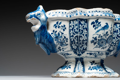 A rare blue and white Dutch Delft tulip vase base with dragon-form handles, 17/18th C.