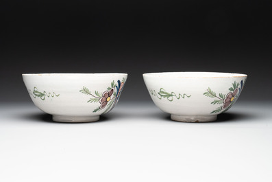 A pair of polychrome Dutch Delft 'duck hunt' bowls, 18th C.