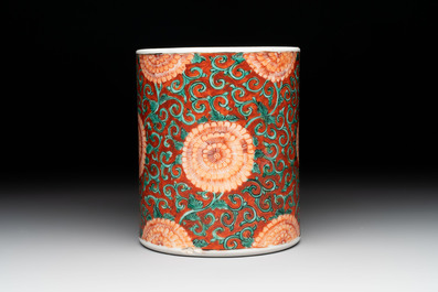 A Chinese famille verte coral-red-ground 'chrysanthemum scroll' brush pot, Kangxi
