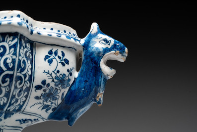A rare blue and white Dutch Delft tulip vase base with dragon-form handles, 17/18th C.