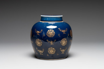 A Chinese gilt-decorated blue-ground jar and cover with floral design, Qianlong