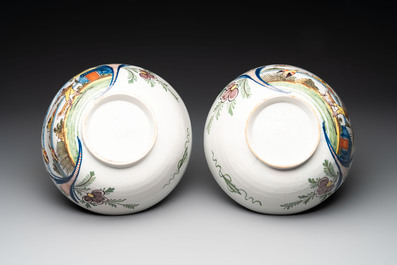 A pair of polychrome Dutch Delft 'duck hunt' bowls, 18th C.