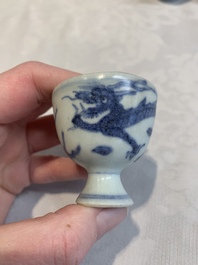 Six Chinese blue and white 'Hatcher cargo' stem cups with dragons, Transitional period