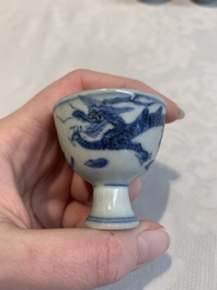 Six Chinese blue and white 'Hatcher cargo' stem cups with dragons, Transitional period