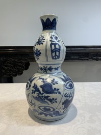 A Chinese blue and white 'flying horse' double gourd vase, Wanli