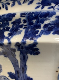 A pair of Chinese blue and white 'birds among flowering branches' jardini&egrave;res, 19th C.