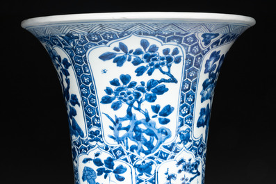 A Chinese blue and white 'gu' vase with floral design, Kangxi
